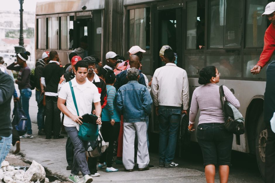 Church group boarding a mini-coach bus for a day trip